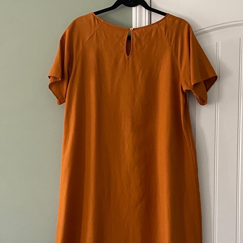 Oriental styled maxi dress with huge front pockets. Worn once.